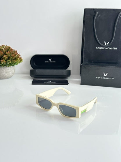 Gentlle Monster Cream and Black Sunglasses