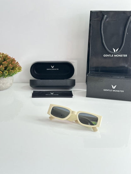 Gentlle Monster Cream and Black Sunglasses
