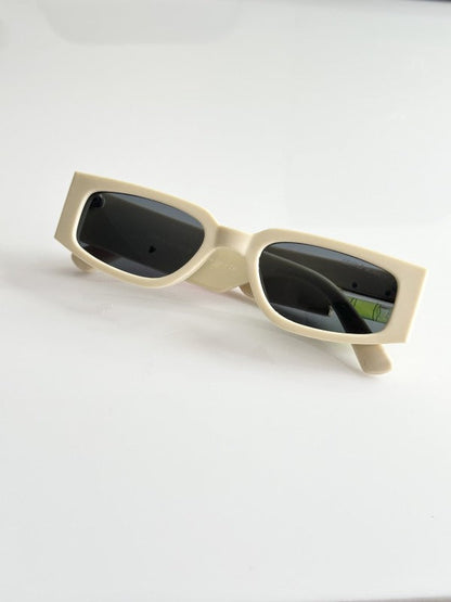 Gentlle Monster Cream and Black Sunglasses